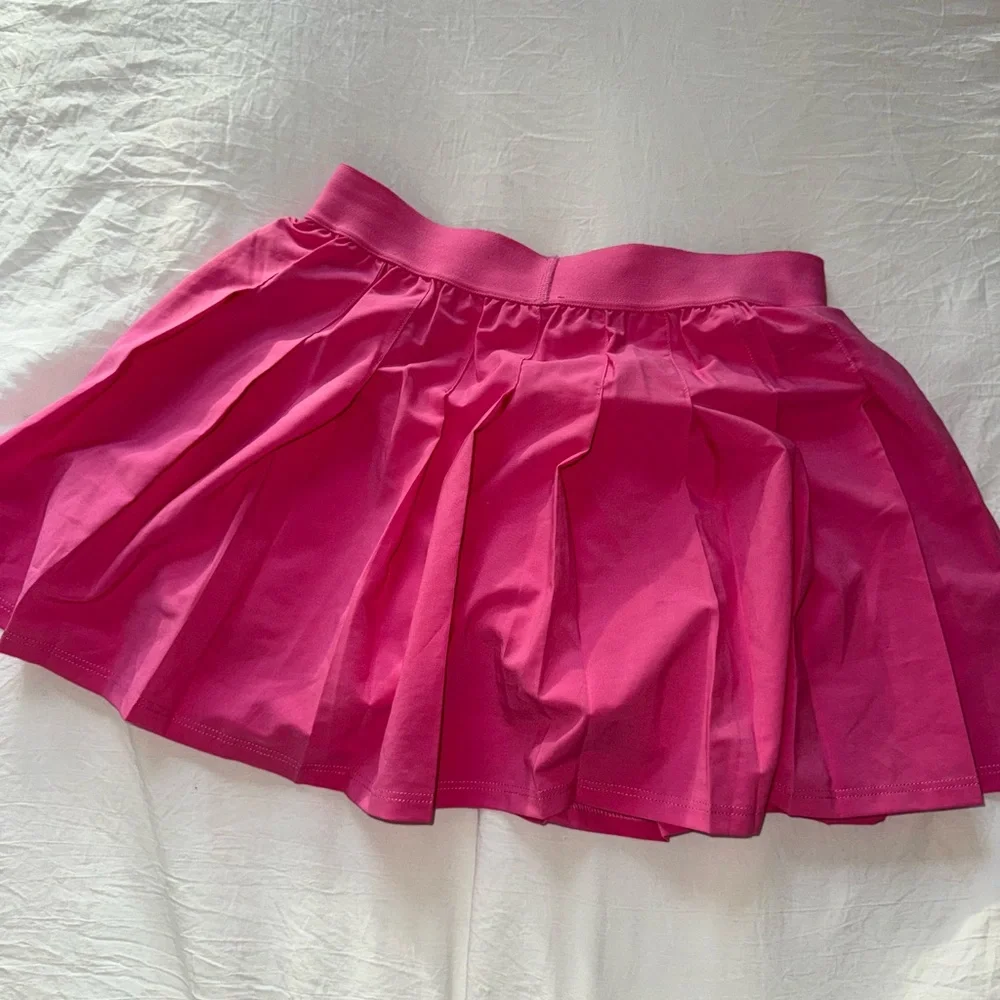 ALO VARSITY TENNIS SKIRT - PARADISE PINK × 1 Paradise Pink / XXS